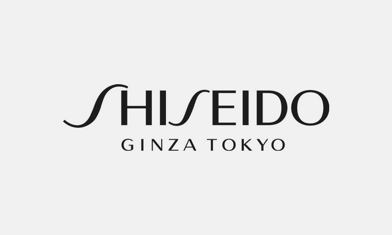 Shiseido – černé logo na světle šedém pozadí