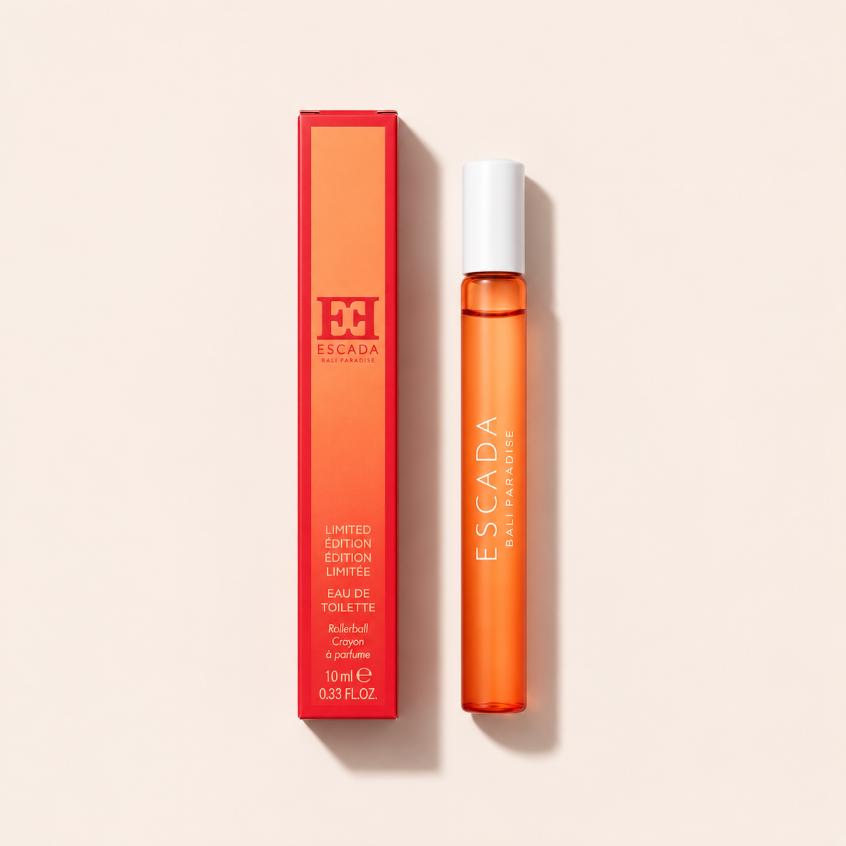 ESCADA Bali Paradise EDT 10 ml – flakon s originálním obalem na béžovém pozadí, pohled shora