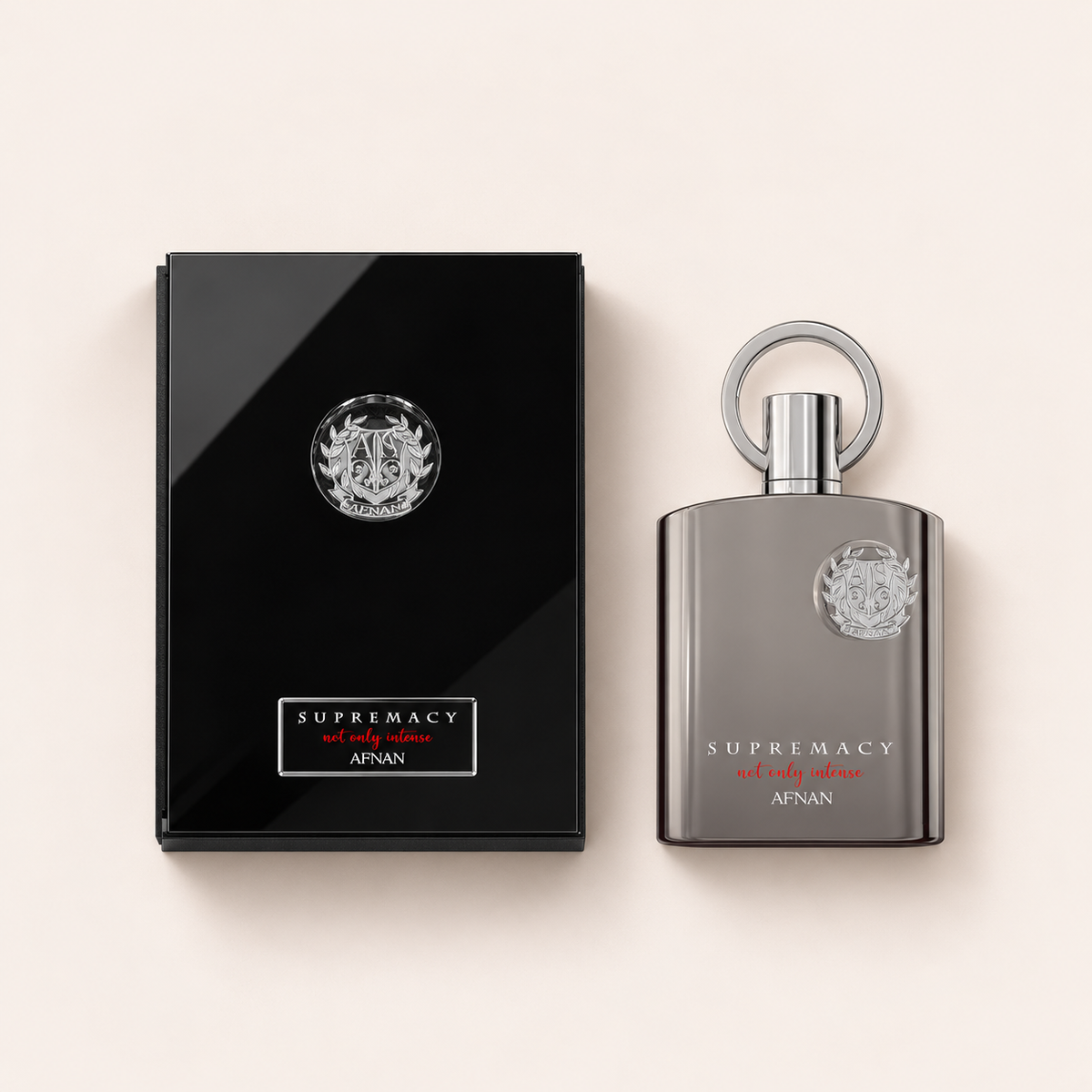 Afnan Supremacy Not Only Intense Extrait de Parfum 100 ml – flakon s originálním obalem na béžovém pozadí, pohled shora