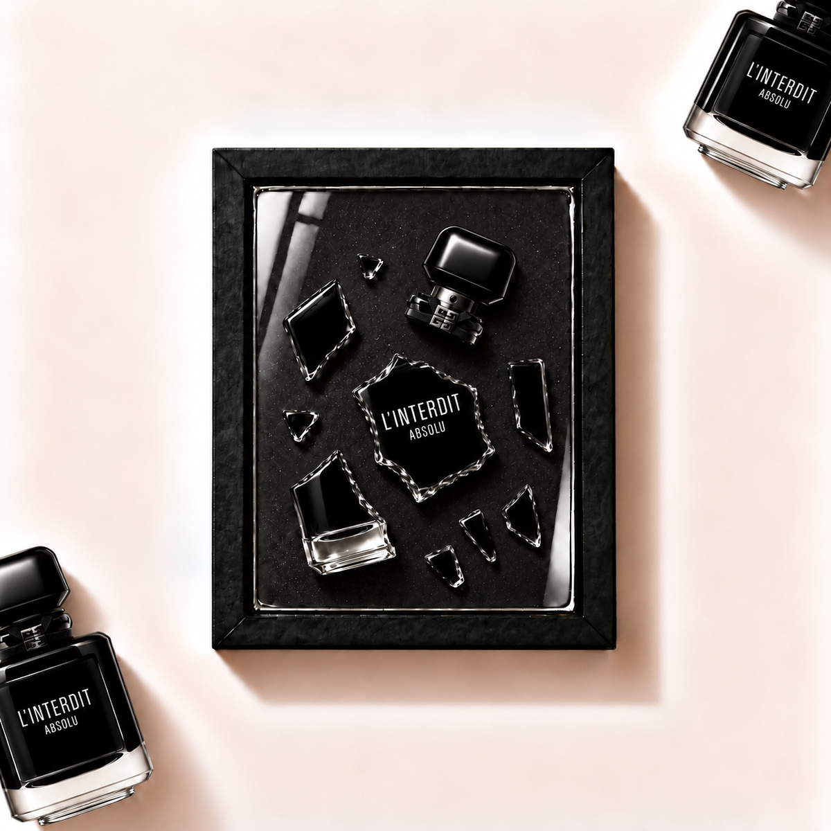 Parfemovy obraz Givenchy L'Interdit Absolu v cernem ramu - ilustracni fotografie