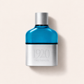Flakon toaletní vody TOUS 1920 The Origin 60 ml na světlém pozadí – MrRizz