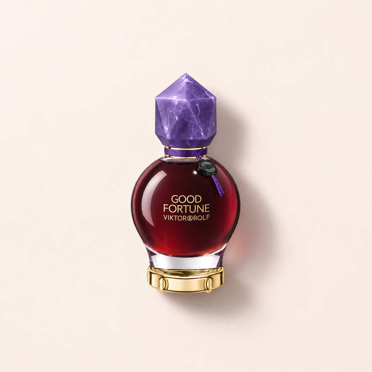 Viktor & Rolf Good Fortune Elixir Intense EDP 50 ml, flakon na teplém světlém pozadí – MrRizz